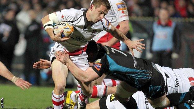 Paul Marshall is tackled by Sam Lewis