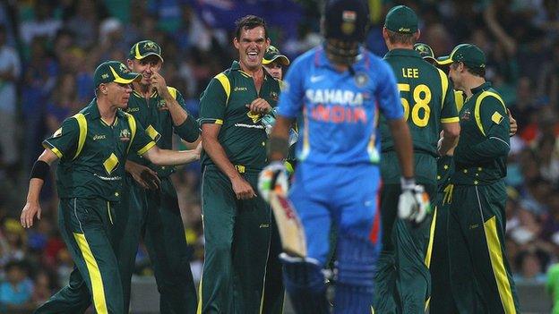 Australia celebrate dismissing India's Gautam Gambhir at the SCG