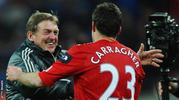 Liverpool manager Kenny Dalglish celebrates the Carling Cup win over Cardiff City