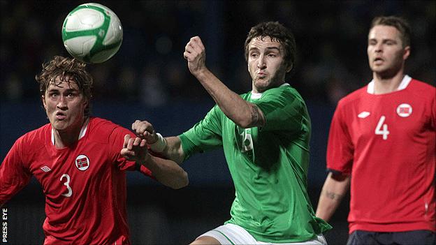 Thomas Rogne of Norway in action against Northern Ireland's Martin Paterson