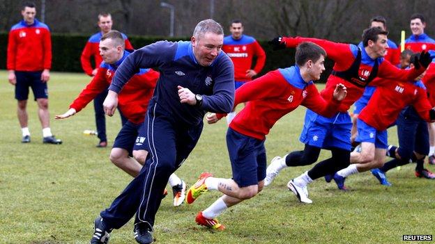Ally McCoist and Rangers players running