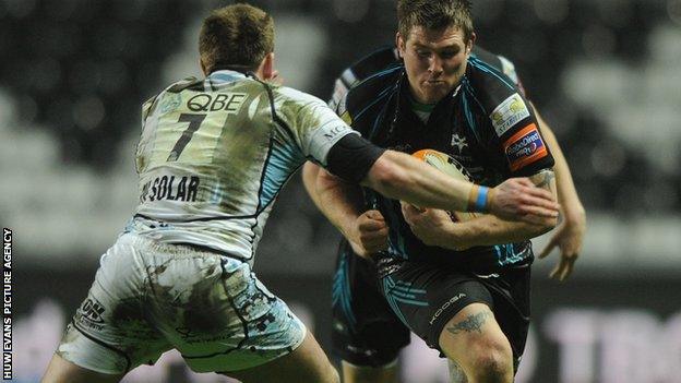 Ospreys hooker Richard Hibbard takes on Glasgow's Chris Fusaro