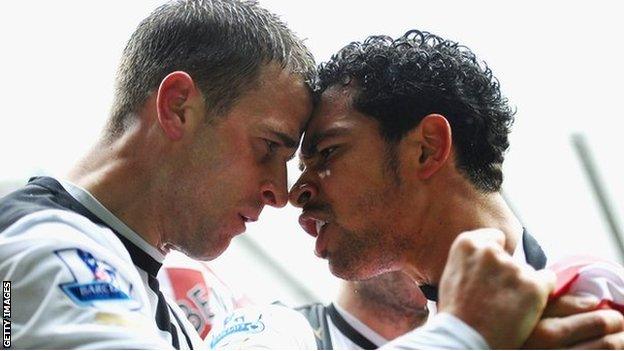 Newcastle's Ryan Taylor [l] goes head to head with Kieran Richardson during a heated derby