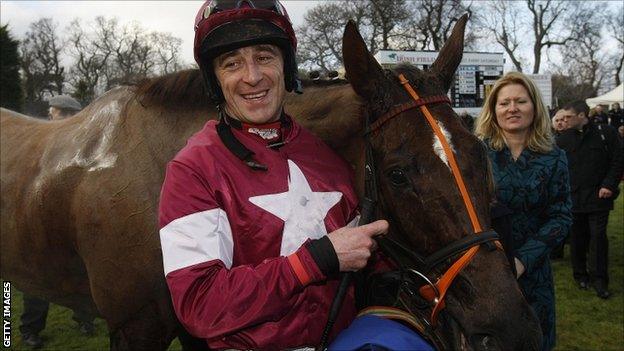 Davy Russell with Last Instalment after winning the Dr. P.J. Moriarty Novice Chase during the Hennessy Gold Cup Day at Leopardstown Racecourse, Ireland.