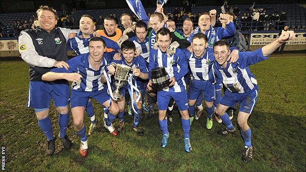 Newry celebrate their Mid-Ulster Cup final win over Glenavon