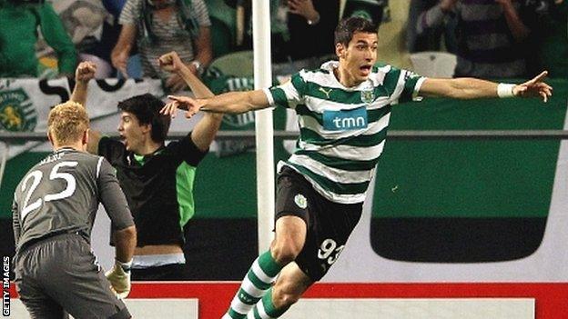 Xandao of Sporting Lisbon (right) celebrates after scoring