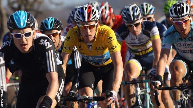 Bradley Wiggins (in yellow) in Saturday's penultimate stage