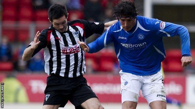 Gary Mason and Francisco Sandaza of Scottish Premier League clubs Dunfermline and St Johnstone, respectively