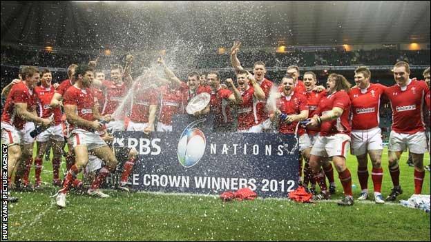 Welsh rugby team celebrate winning the Triple Crown