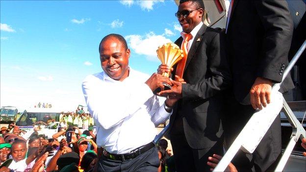 Zambian FA chief Kalusha Bwalya brings the Africa Cup of Nations trophy home