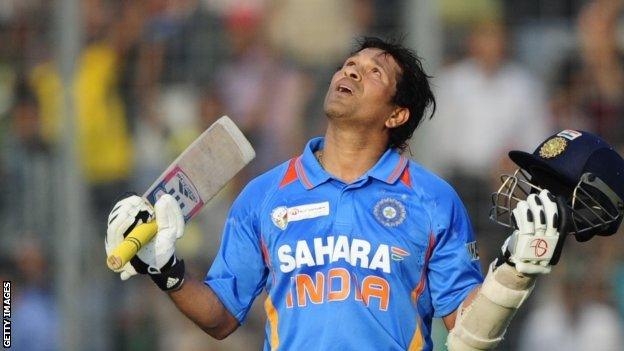 Sachin Tendulkar celebrates scoring his 100th international century