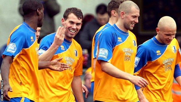 Louis Briscoe celebrates his hat-trick