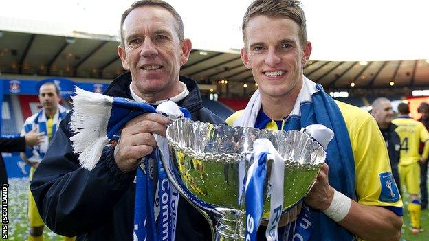 Kilmarnock manager Kenny Shiels celebrates with his son Dean