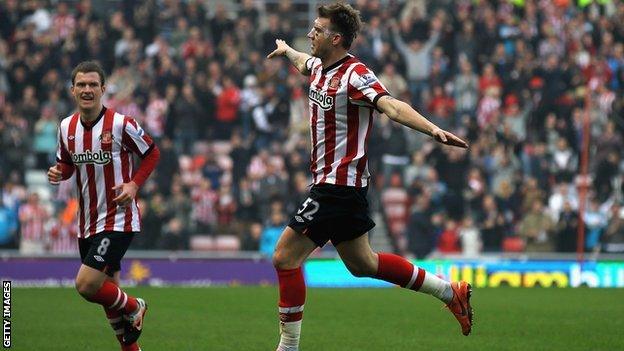 Nicklas Bendtner celebrates his goal