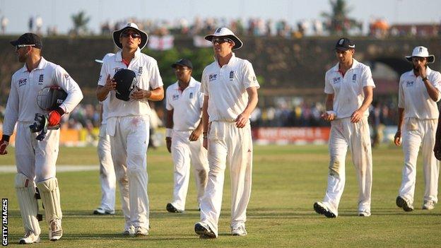 England players leave the field after a fluctuating opening day in Galle