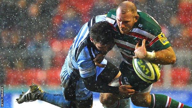 Leicester's Rob Hawkins (right) is tackled by Will Chudley of Newcastle