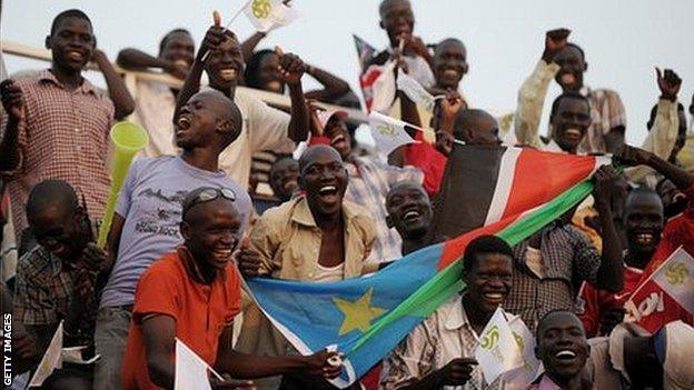 South Sudanese fans cheer their national team's first match in a friendly against Kenya side Tusker to celebrate independence last July