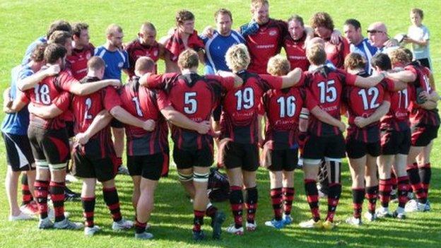 Jersey team huddle