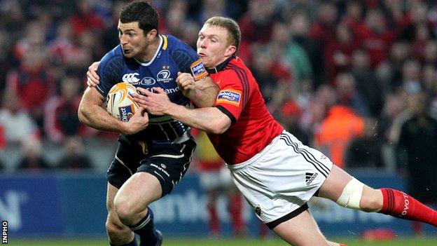 Keith Earls tackles Rob Kearney at Thomond Park