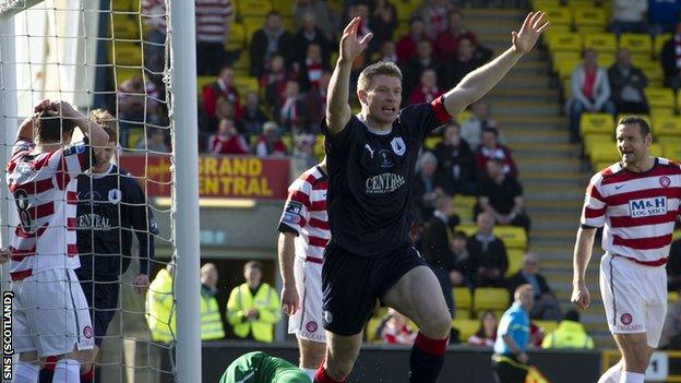 Dods celebrates his winning goal at Livingston's Almondvale Stadium