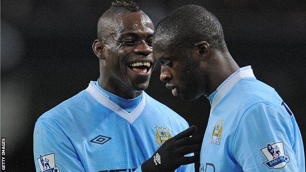 Manchester City's Mario Balotelli and Yaya Toure