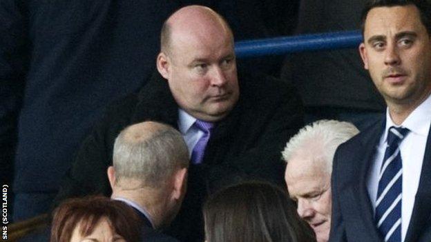 Ellis takes his seat at Ibrox after becoming a non-executive director