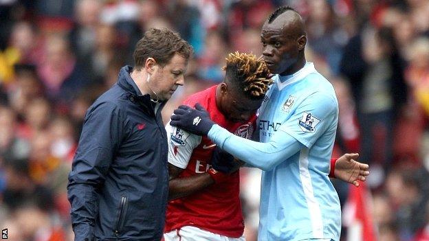 Alex Song and Mario Balotelli