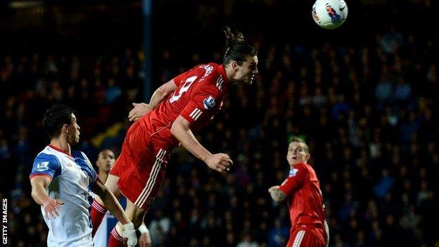 Andy Carroll heads the winner