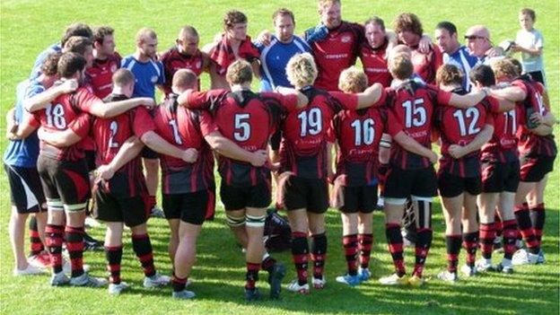 Jersey team huddle