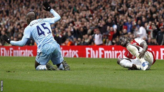 Mario Balotelli (left) was dismissed at Arsenal after receiving two yellow cards