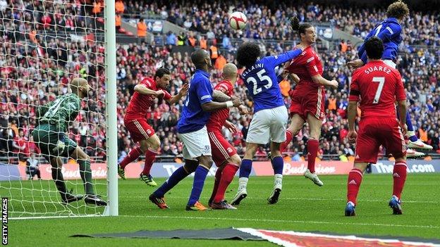 Andy Carroll heads in winner against Everton