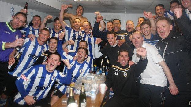 Chester's players celebrate promotion