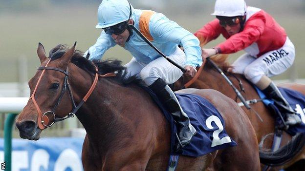 Esentepe ridden by Pat Dobbs goes on to win the Lanwades Stud Nell Gwyn stakes