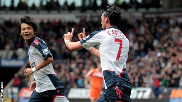 Chris Eagles celebrates scoring Bolton's equaliser against Swansea