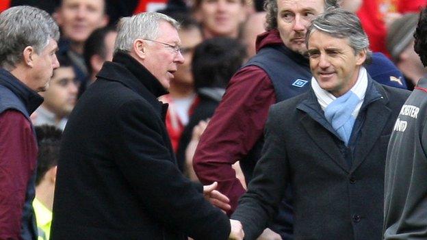 Manchester United manager Sir Alex Ferguson (left) and Manchester City boss Roberto Mancini