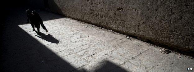 Boy playing in Kabul street