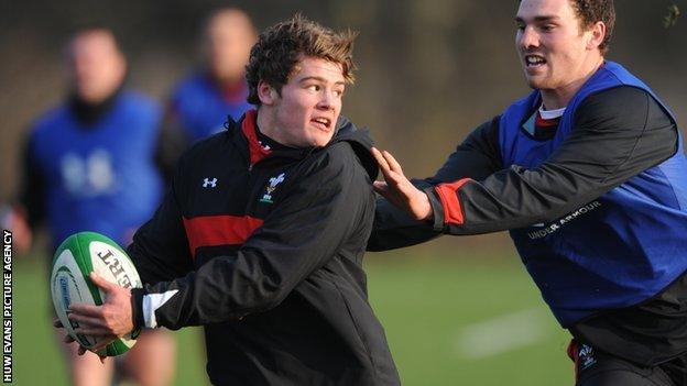 Harry Robinson evades George North in Wales Six Nations training