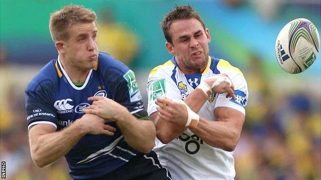 Luke Fitzgerald (left) battles with Lee Byrne in last year's Heineken Cup semi-final