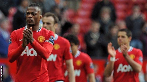 Patrice Evra applauds fans after Sunday's 2-0 win over Swansea