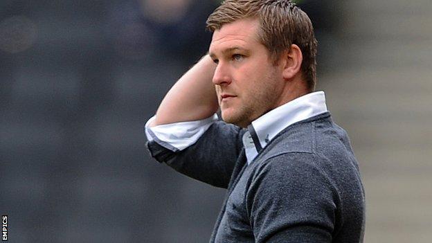 MK Dons boss Karl Robinson