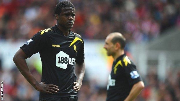 Dedryck Boyata (left) and Martin Petrov of Bolton Wanderers look dejected