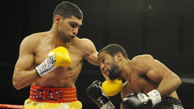 Amir Khan meets Lamont Peterson in December 2011