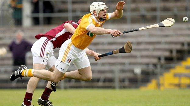 Antrim's Neil McManus battles with Westmeath's Aonghus Clarke