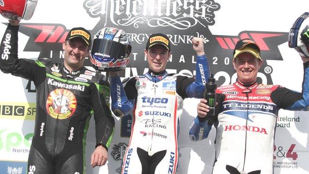 Michael Rutter, Alastair Seeley and John McGuinness on the podium after the second Superbike race