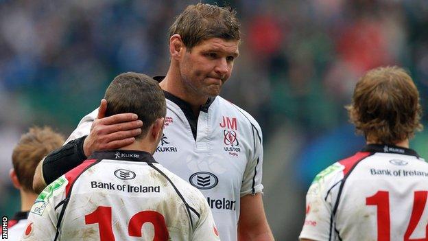 Ulster captain Johann Muller consoles Paddy Wallace after Saturday's final