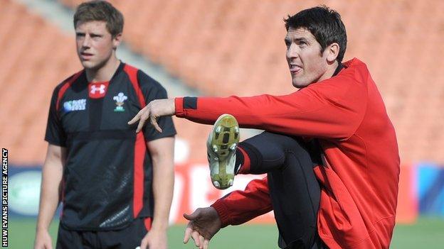 James Hook kicks as Rhys Priestland looks on