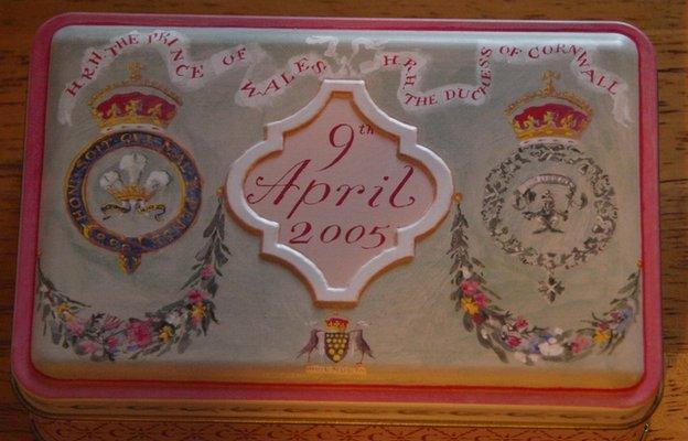 Biscuit tin inscribed with the date of Prince Charles's wedding date