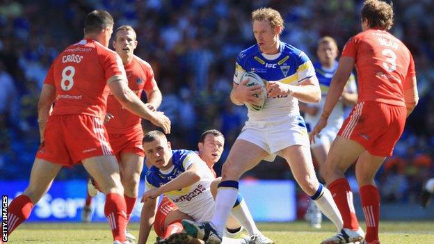 Joel Monaghan attempts to beat the Widnes defence