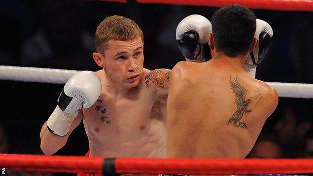 Carl Frampton tackles Raul Hirales during the IBF Inter-Continental Super-Bantamweight bout in Nottingham