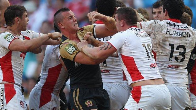 Wigan and St Helens players were involved in a mass brawl during their Magic Weekend encounter